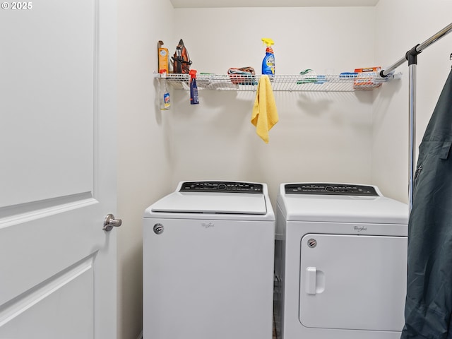 laundry area with washer and clothes dryer