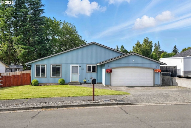 1208 SE Chapman Ave, Troutdale, OR 97060 - ranch-style house featuring an attached garage and asphalt driveway