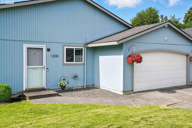 1208 SE Chapman Ave, Troutdale, OR 97060 - view of front of house featuring roof with shingles, an attached garage, and a front lawn