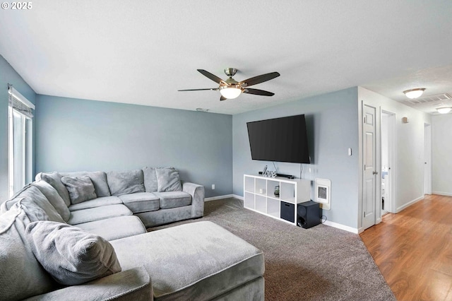 1208 SE Chapman Ave, Troutdale, OR 97060 - living area featuring a ceiling fan and baseboards