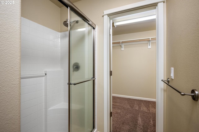 20937 SW Edgemont St, Beaverton, OR 97003 - bathroom featuring a stall shower and a walk in closet