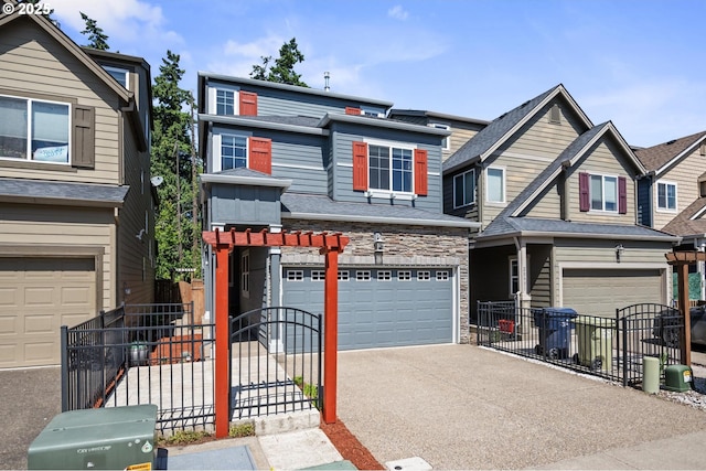 20937 SW Edgemont St, Beaverton, OR 97003 - townhome / multi-family property with an attached garage, stone siding, and driveway