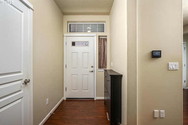 20937 SW Edgemont St, Beaverton, OR 97003 - hallway featuring dark wood-style floors, baseboards, and a textured ceiling