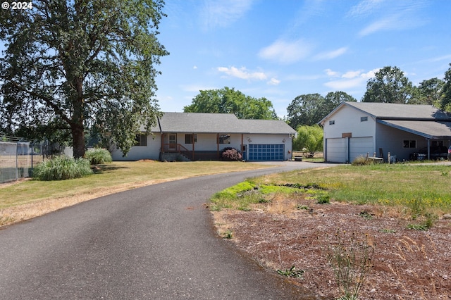 ranch-style house featuring a garage