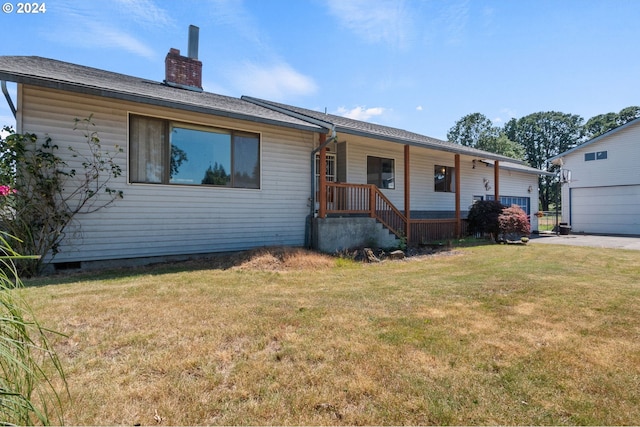 ranch-style home featuring a front yard and a porch