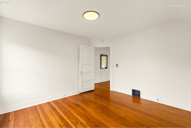 5125 NE Davis St, Portland, OR 97213 - spare room with baseboards and wood finished floors