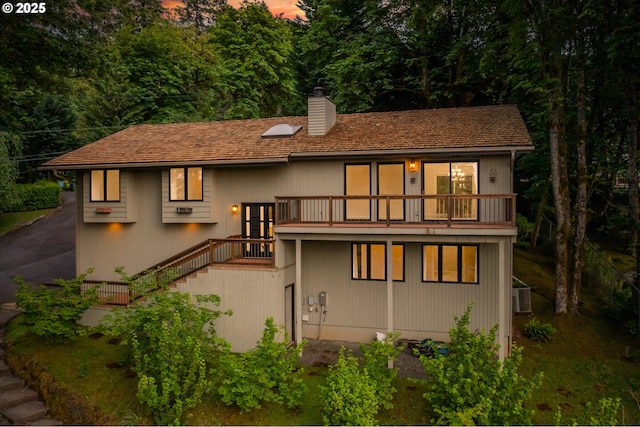 1610 Lee St, Lake Oswego, OR 97034 - back of property with a balcony, a chimney, and stairs