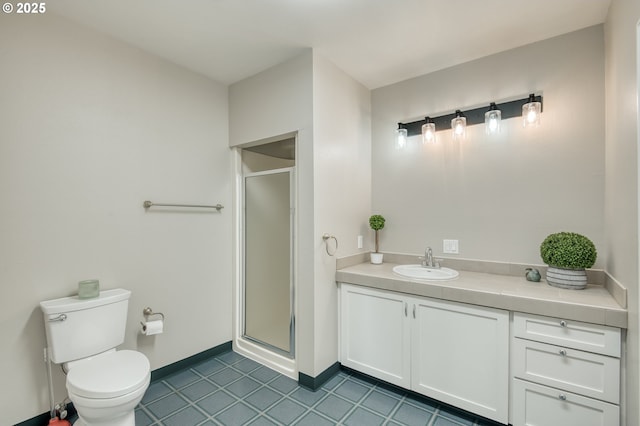 1610 Lee St, Lake Oswego, OR 97034 - bathroom featuring a shower stall, toilet, tile patterned flooring, and vanity