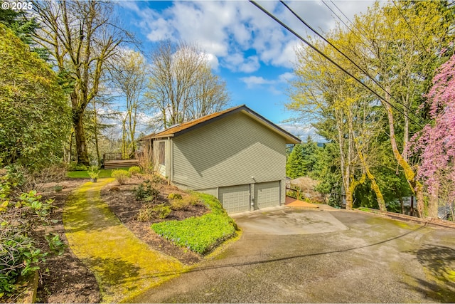 1610 Lee St, Lake Oswego, OR 97034 - view of property exterior with driveway and an attached garage