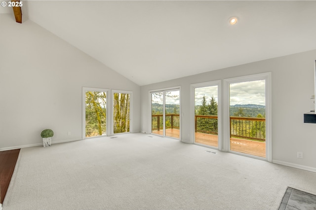 1610 Lee St, Lake Oswego, OR 97034 - unfurnished living room with carpet floors, high vaulted ceiling, baseboards, and beam ceiling