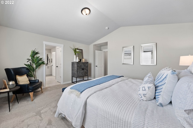 bedroom with baseboards, light colored carpet, and lofted ceiling