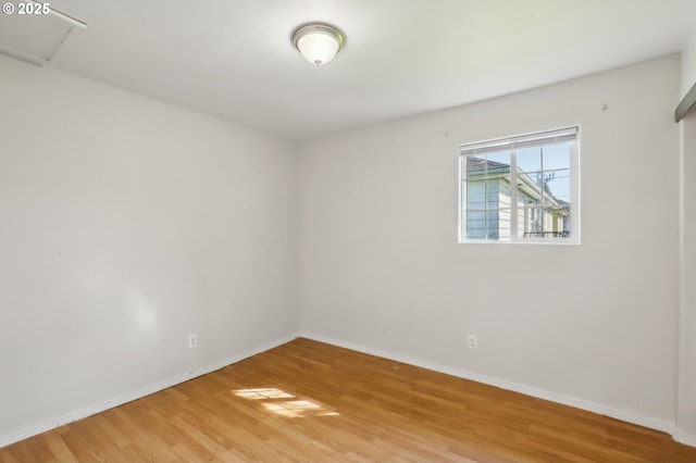 707 S 6th Ave, Kelso, WA 98626 - empty room featuring baseboards and light wood-style flooring