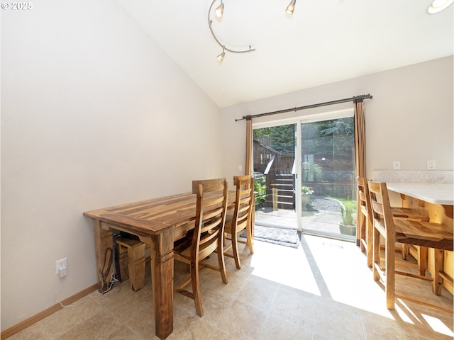 1007 4th Ave, Vernonia, OR 97064 - dining area featuring vaulted ceiling and baseboards