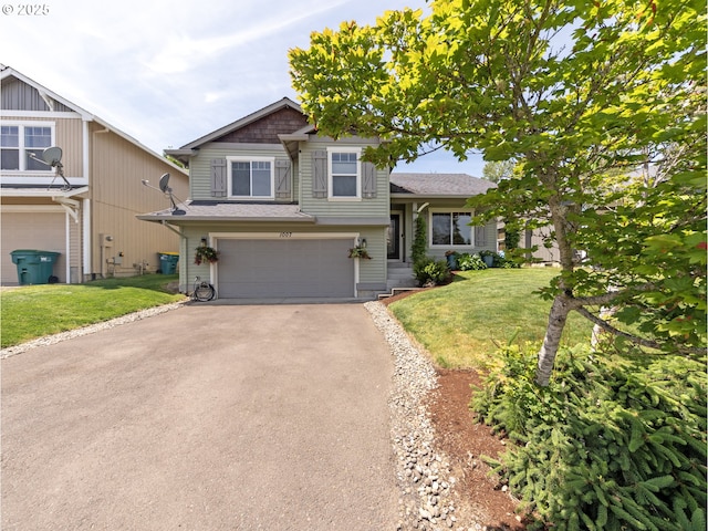 1007 4th Ave, Vernonia, OR 97064 - split level home with driveway, a garage, a front yard, and roof with shingles