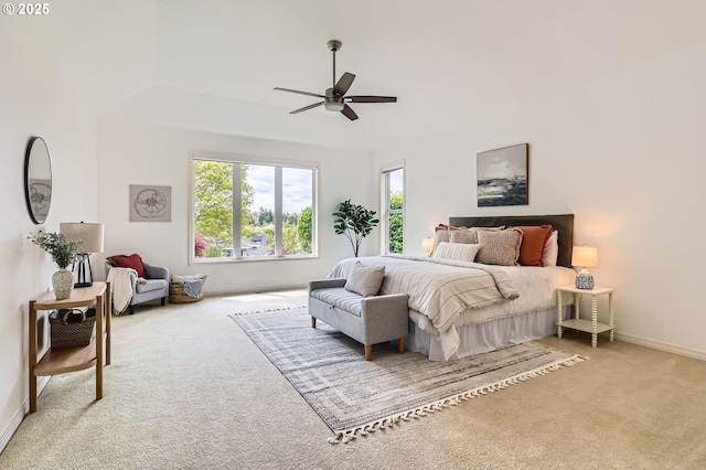 carpeted bedroom with baseboards and ceiling fan