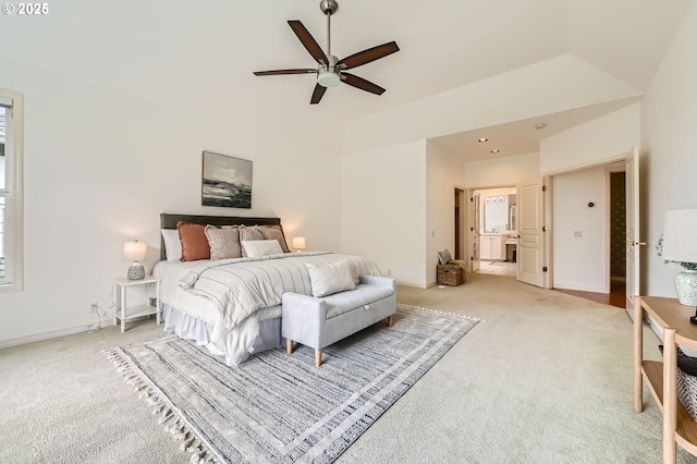 bedroom featuring light colored carpet, ensuite bath, recessed lighting, baseboards, and a ceiling fan