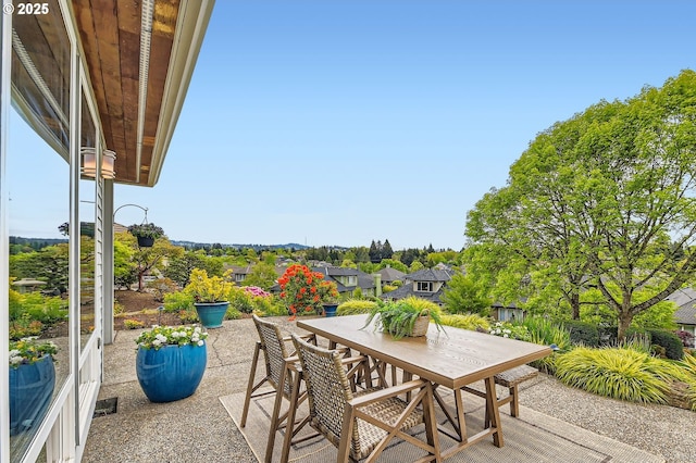 balcony with visible vents, outdoor dining area, and a patio area