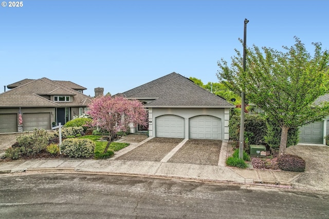 view of front of home featuring a chimney and stucco siding