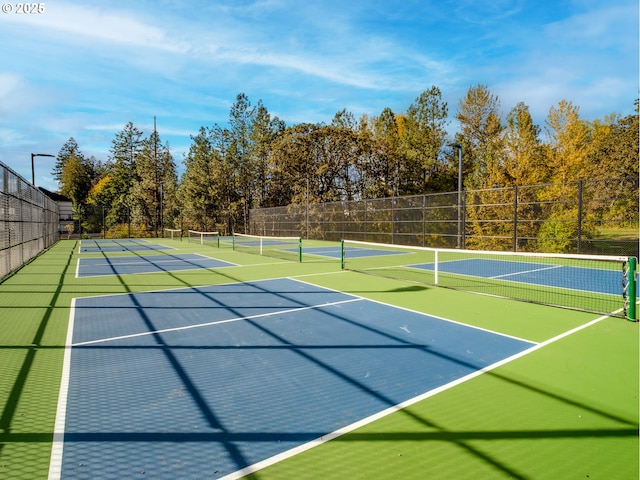 view of sport court featuring community basketball court and fence