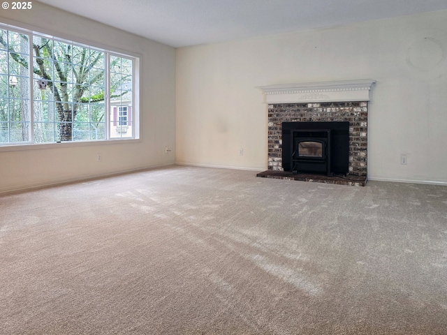 unfurnished living room with carpet flooring