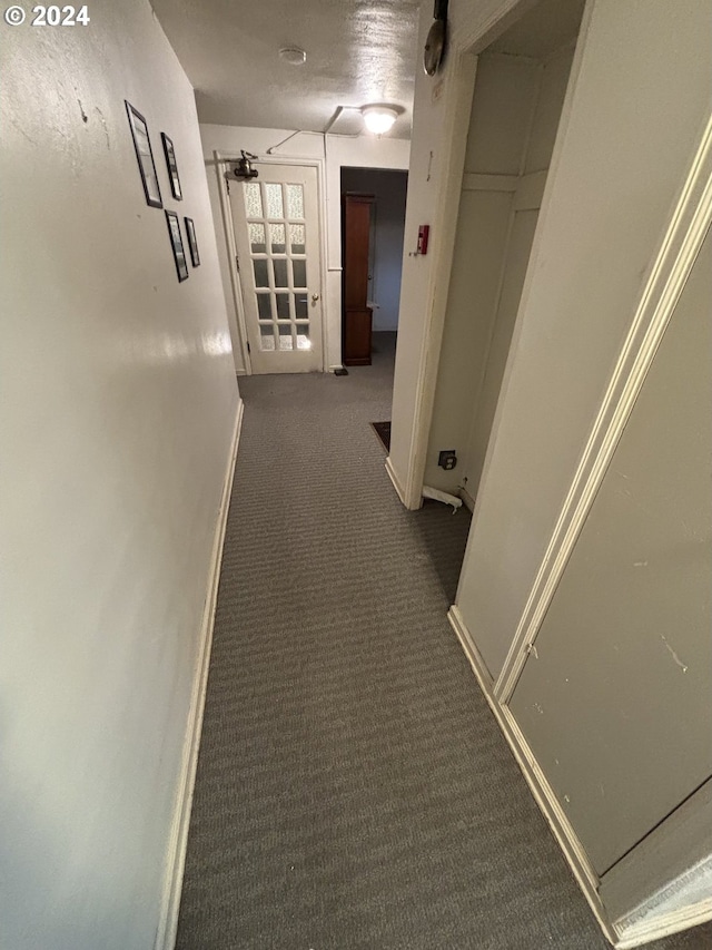 646 SE 60th Ave, Portland, OR 97215 - hallway with baseboards and carpet