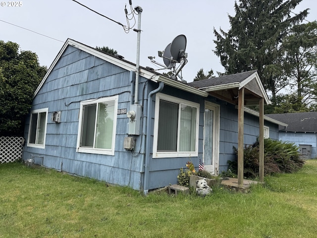 90530 Lewis Rd, Warrenton, OR 97146 - view of side of home featuring a yard
