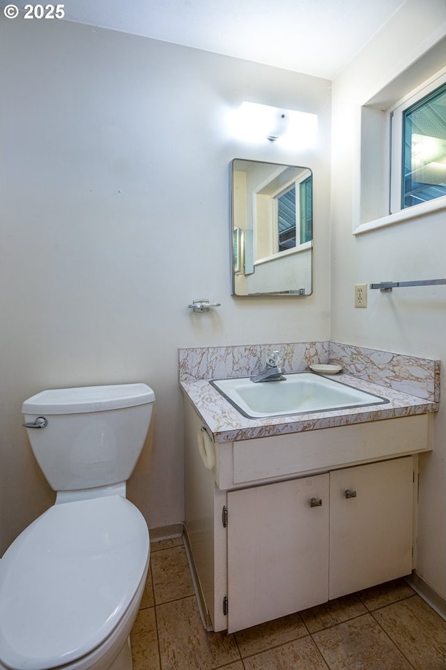 965 Robin Hood Ave, Eugene, OR 97401 - half bathroom featuring vanity and toilet