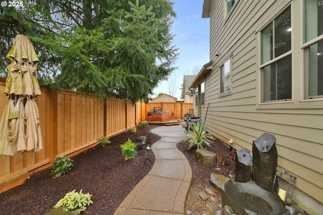 view of yard with a fenced backyard