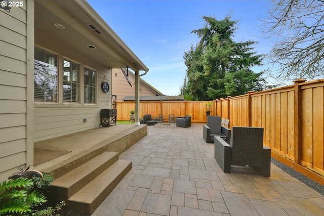 view of patio / terrace featuring a fenced backyard