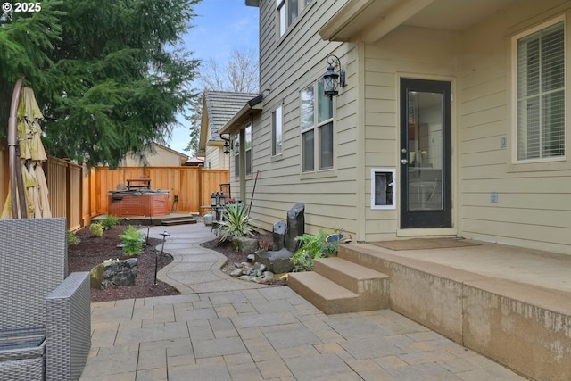 view of patio featuring fence