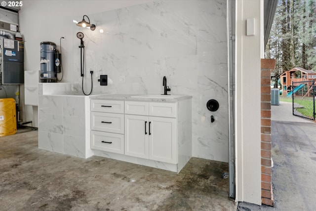 9423 NE 180th Way, Battle Ground, WA 98604 - bathroom featuring a marble finish shower and vanity