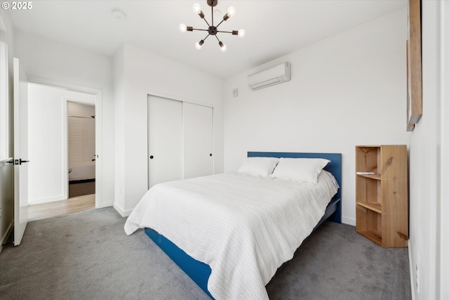 1375 N Wygant St, Portland, OR 97217 - bedroom with a wall mounted air conditioner, carpet, a chandelier, a closet, and baseboards
