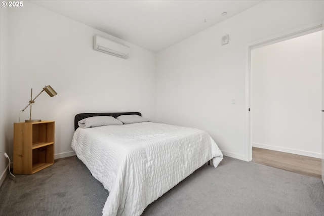 1375 N Wygant St, Portland, OR 97217 - carpeted bedroom featuring a wall mounted air conditioner and baseboards