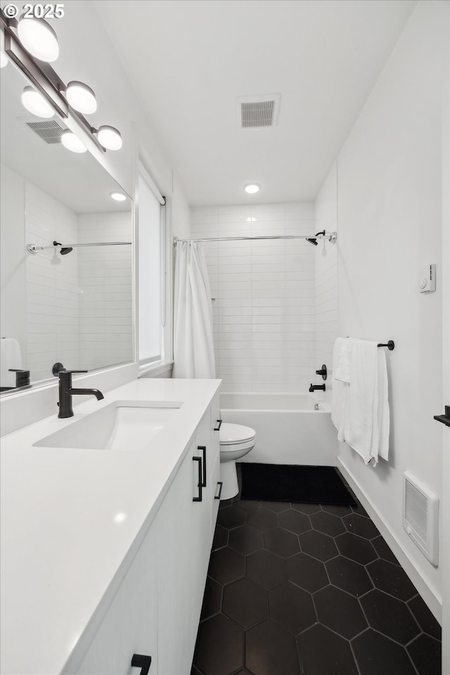 1375 N Wygant St, Portland, OR 97217 - bathroom with vanity, shower / bath combo with shower curtain, tile patterned floors, toilet, and recessed lighting