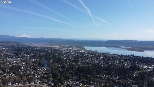 exterior space featuring a water and mountain view