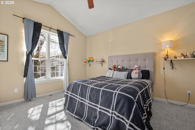 bedroom with lofted ceiling, carpet, baseboards, and ceiling fan