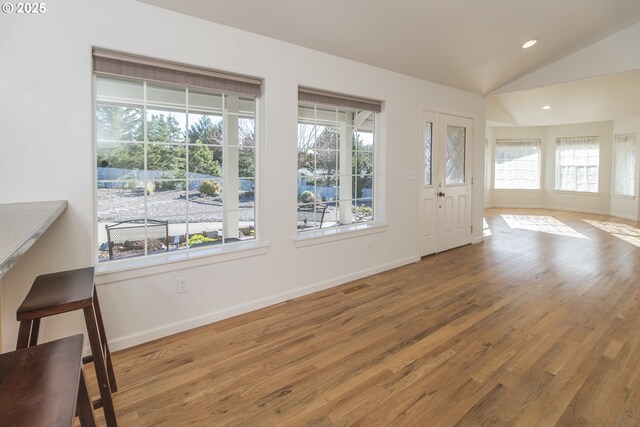 1985 32nd St, Florence, OR 97439 - foyer with baseboards and wood finished floors