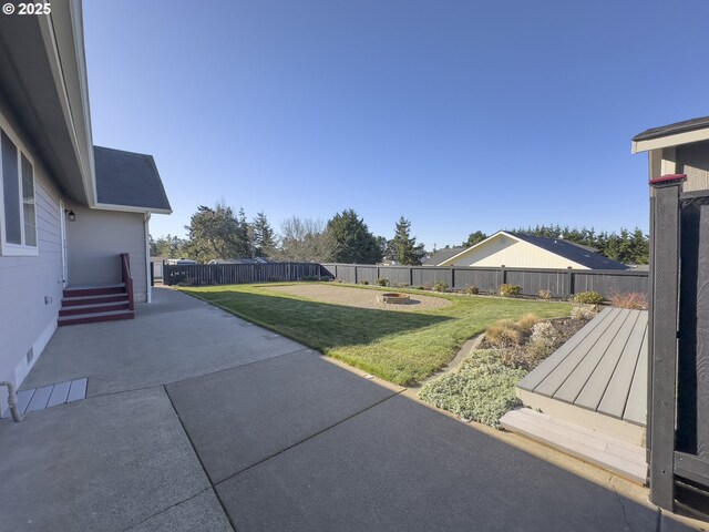 1985 32nd St, Florence, OR 97439 - view of yard featuring a patio and a fenced backyard