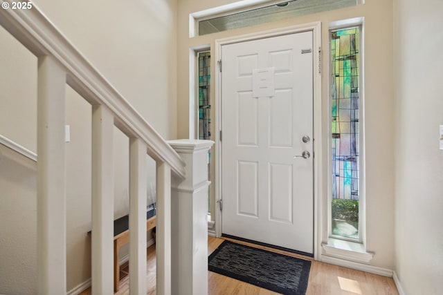 foyer with light hardwood / wood-style floors