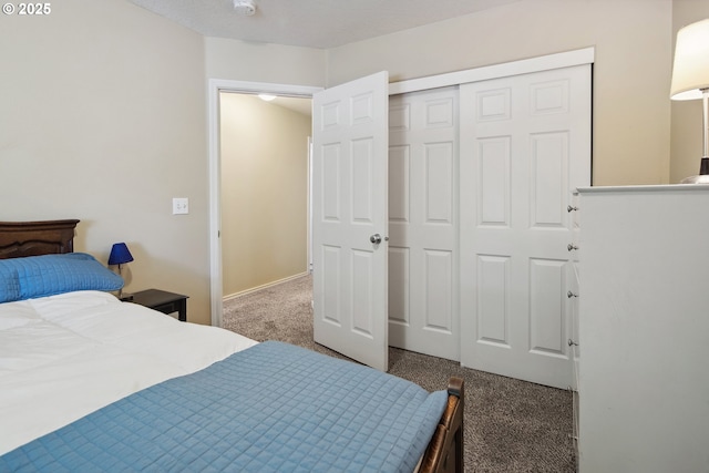 carpeted bedroom with a closet