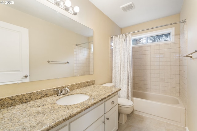 full bathroom featuring tile patterned flooring, visible vents, toilet, vanity, and shower / bathtub combination with curtain