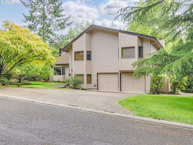 2972 Tolkien Ln, Lake Oswego, OR 97034 - mid-century inspired home with an attached garage, concrete driveway, and a front yard
