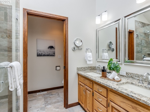 2972 Tolkien Ln, Lake Oswego, OR 97034 - full bath with a stall shower, double vanity, and baseboards
