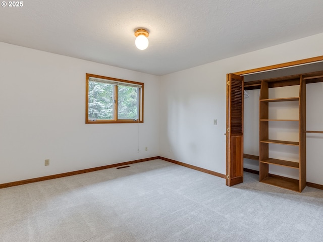 2972 Tolkien Ln, Lake Oswego, OR 97034 - unfurnished bedroom with light colored carpet, baseboards, and a closet
