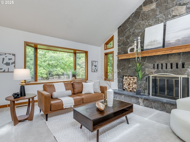 2972 Tolkien Ln, Lake Oswego, OR 97034 - living area with lofted ceiling, plenty of natural light, concrete floors, and a stone fireplace
