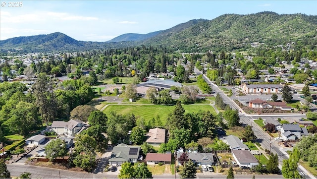bird's eye view featuring a mountain view and a residential view