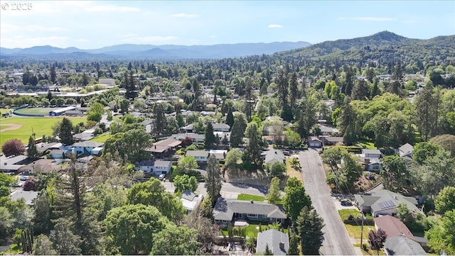 bird's eye view with a residential view and a mountain view