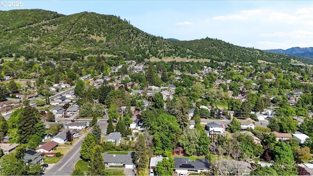 birds eye view of property featuring a residential view and a mountain view