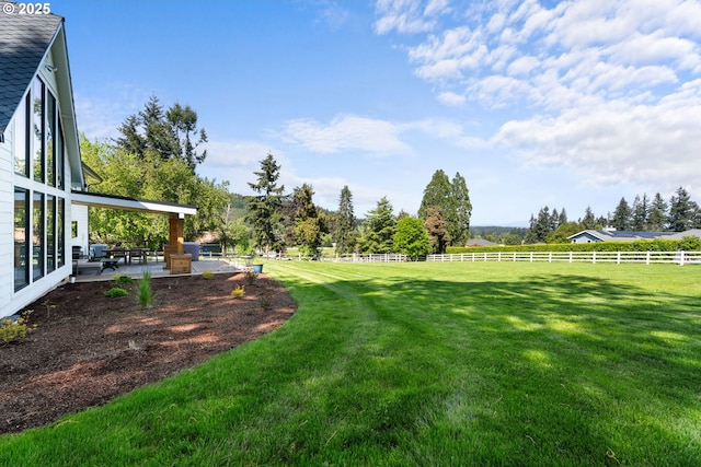 view of yard with a patio area