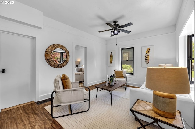 6206 N Denver Ave, Portland, OR 97217 - living area featuring ceiling fan, wood finished floors, and baseboards
